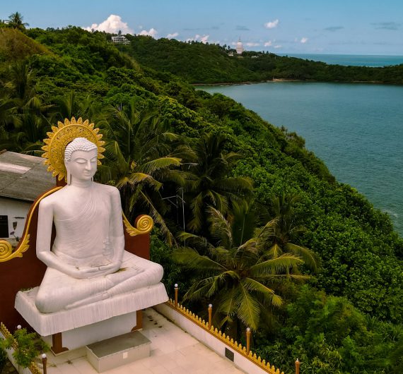 Buddha statue next to the sea