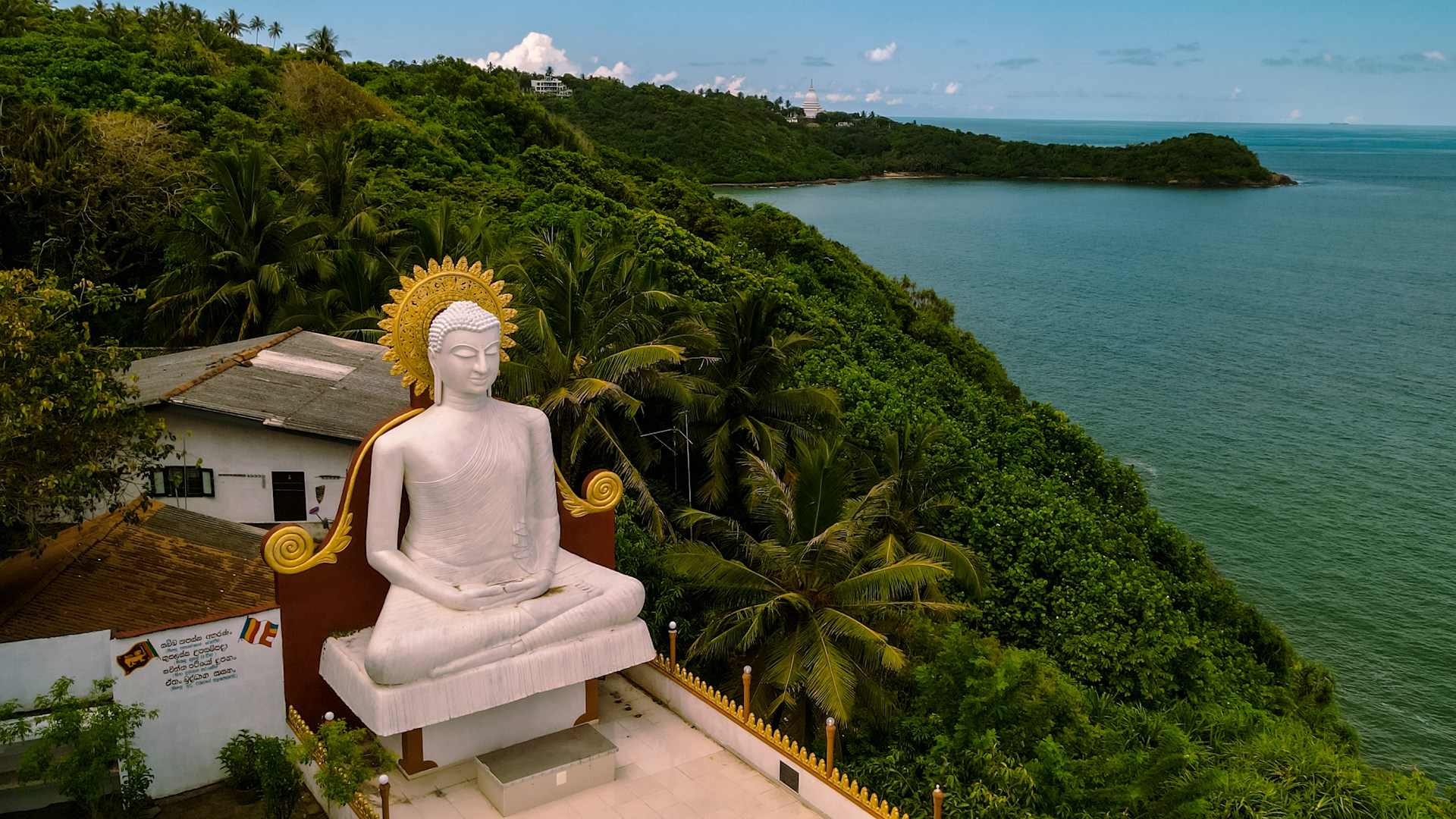 Buddha statue next to the sea